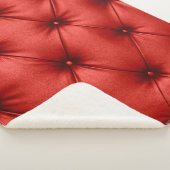 Close up background texture of scarlet red capiton sherpadecke (3/4)