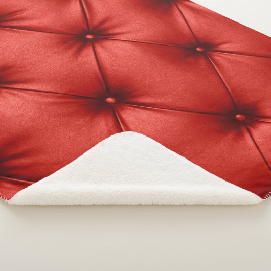Close up background texture of scarlet red capiton sherpadecke (3/4)