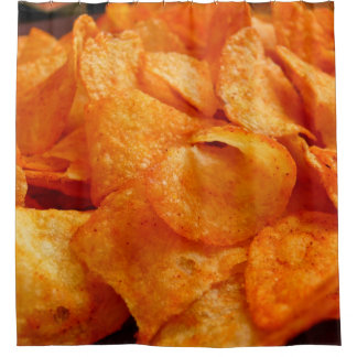 Close up of juicy, crispy, chips on black plate. duschvorhang