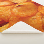 Close up of juicy, crispy, chips on black plate. sherpadecke (3/4)