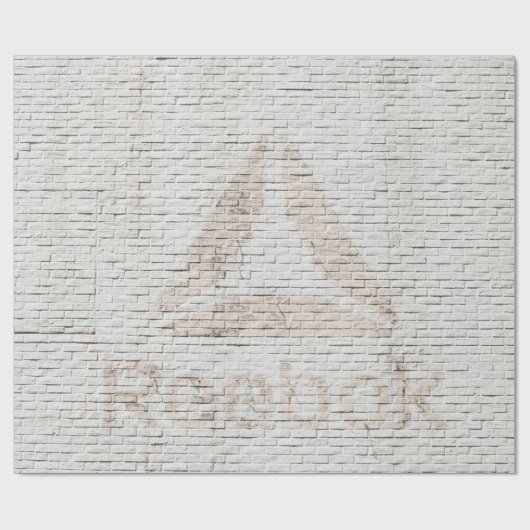 Close-up photo of Reebok logo on wall Geschenkpapier (Flach)
