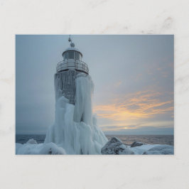 coastal lighthouse in winter storm postkarte