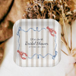 Coastal Theme She's a Catch Lobster Bridal Shower Pappteller<br><div class="desc">Elevate your bridal shower with these charming "She's a Catch" lobster-themed paper plates! Featuring a beautiful watercolor design with red lobsters, flowing blue ribbons, bows, and classic beige stripes on a neutral background. Perfect for a nautical, coastal, beach, or summer bridal shower celebration. Playful pun design adds a fun touch...</div>