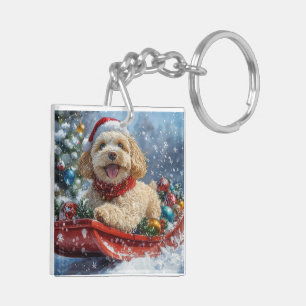 Cockapoo-Hund im Schlitten Lass es schneien Weihna Schlüsselanhänger