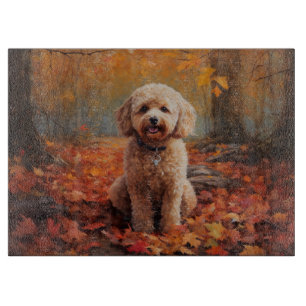 Cockapoo im Herbstlaubfall inspiriert Schneidebrett