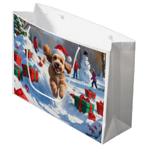 Cockapoo läuft im Schnee mit Weihnachtsmütze Große Geschenktüte