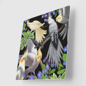 Cockatiels in der Vergissmeinnicht-Wanduhr Quadratische Wanduhr (Winkel)