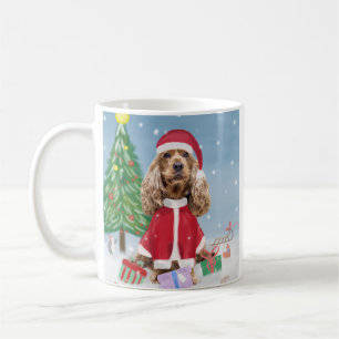 Cocker Spaniel Hund im Schnee mit Weihnachtsgesche Kaffeetasse