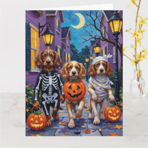 Cocker Spaniel Hunde beim Trick-or-Treat an Hallow Karte