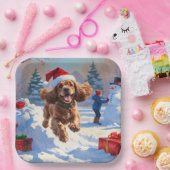 Cocker Spaniel läuft in Schnee mit Weihnachtshut Pappteller (Party)