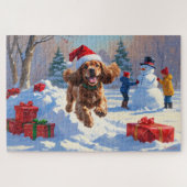 Cocker Spaniel läuft in Schnee mit Weihnachtshut Puzzle (Horizontal)