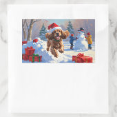 Cocker Spaniel läuft in Schnee mit Weihnachtshut Rechteckiger Aufkleber (Tasche)