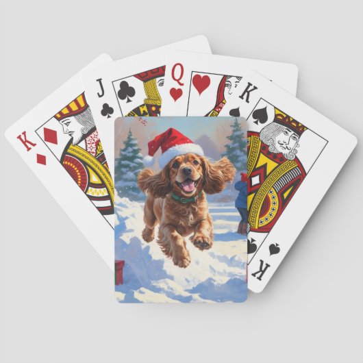 Cocker Spaniel läuft in Schnee mit Weihnachtshut Spielkarten (Rückseite)