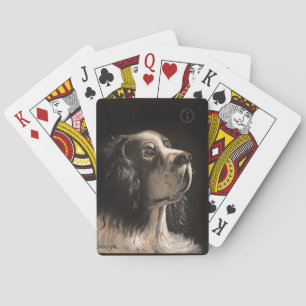 Cocker Spaniel spielt Pokerkarten