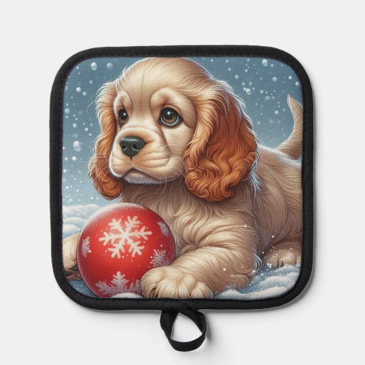 Cocker Spaniel Welpe auf Schnee mit einer Kugel Topflappen (Vorderseite)