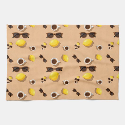 Coffee lemons and sunglasses on a warm sand geschirrtuch (Horizontal)