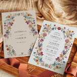 Colorful & Bold Boho Flower Garden Wedding Einladung<br><div class="desc">Our watercolor floral wedding invitation boasts a stunning and intricate floral wreath design that is sure to make a statement. The vibrant colors of the blooms are perfectly complemented by the understated elegance of the modern typography, creating a balanced and harmonious design. The watercolor effect adds a touch of whimsy...</div>