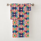 Colorful geometric-patterned towels hang  badhandtuch set