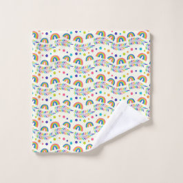 colorful rainbow-patterned towel set and washcloth