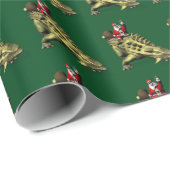 Comical Santa Claus Reiten auf Talarurus Geschenkpapier (Rolleneckpunkt)