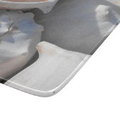 Conch-Muscheln schließen Schneidebrett (Ecke)