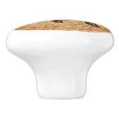 Cookie mit einem Biss, der ausgenommen wird Keramikknauf (Seitenansicht)