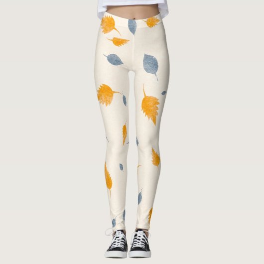 Coole, blaue und goldgelbe Blätter auf Creme Leggings (Vorderseite)