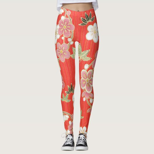 Coole Blume verschiedener Farben auf orangefarbene Leggings (Vorderseite)