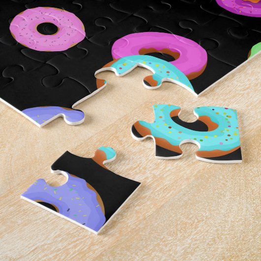 Coole, bunte Donuts schwarz Puzzle (Seite)