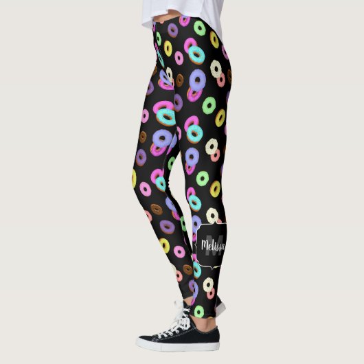 Coole, bunte Donuts schwarze Monogramm Leggings (Links)