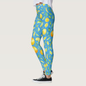 Coole Zitrusfrüchte auf türkisfarbenem Wasserfarbm Leggings (Links)