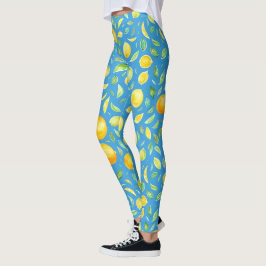 Coole Zitrusfrüchte auf türkisfarbenem Wasserfarbm Leggings (Links)