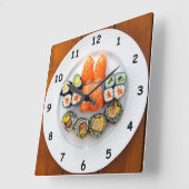 Cooler Sushi und Lachs auf einer weißen Platte Quadratische Wanduhr (Winkel)