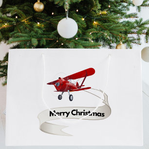 Cooles Flugzeug mit fröhlichem Weihnachtsbanner Große Geschenktüte