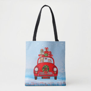 Corgi-Hund im Auto mit dem Weihnachtsmann Tasche