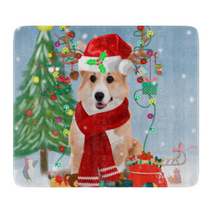 Corgi Hund in Schnee mit Weihnachtsgeschenken Schneidebrett