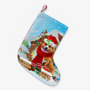Corgi Hund mit Weihnachtsgeschenken Kleiner Weihnachtsstrumpf