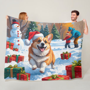 Corgi läuft im Schnee mit Weihnachtshut Fleecedecke