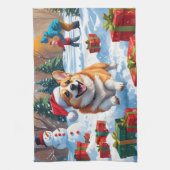 Corgi läuft im Schnee mit Weihnachtshut Geschirrtuch (Vertikal)