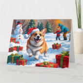 Corgi läuft im Schnee mit Weihnachtshut Karte (Vorderseite)