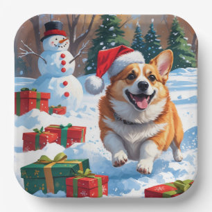 Corgi läuft im Schnee mit Weihnachtsmütze Pappteller