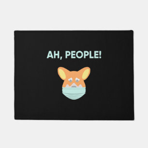 Corgi trägt eine Maske Fußmatte