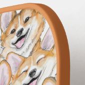 Corgis auf einem Pickleball Paddle (Linke Seite)