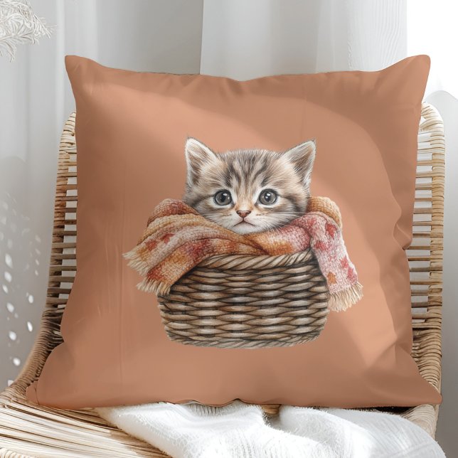 Cosy Basket Cat Pillow - Terracotta Edition Kissen (Cozy Basket Cat Pillow – Terracotta Edition in a sunny boho rattan chair.)