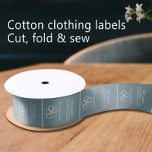 Cotton-Logo weiß auf dusus-blauem Bekleidungslabel