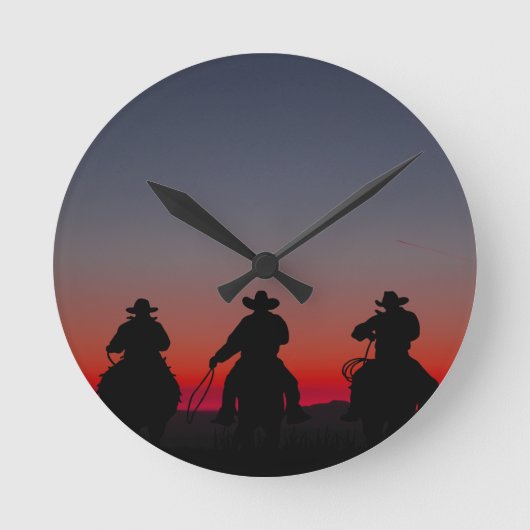 Cowboy bei Sonnenuntergang Runde Wanduhr (Vorderseite)