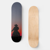 Cowboy bei Sonnenuntergang Skateboard (Vorderseite)