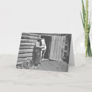 Cowboy, der einen Brief liest Karte