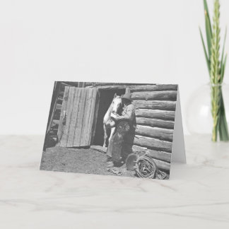 Cowboy, der einen Brief liest Karte