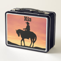 Cowboy on Horseback at Sunset
